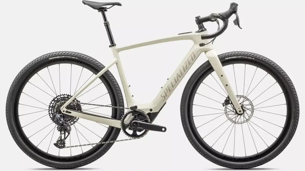 Spezialisiertes Turbo Creo 2 Expert E-Gravelbike in hellem Farbton mit auffälliger Punktmusterung.