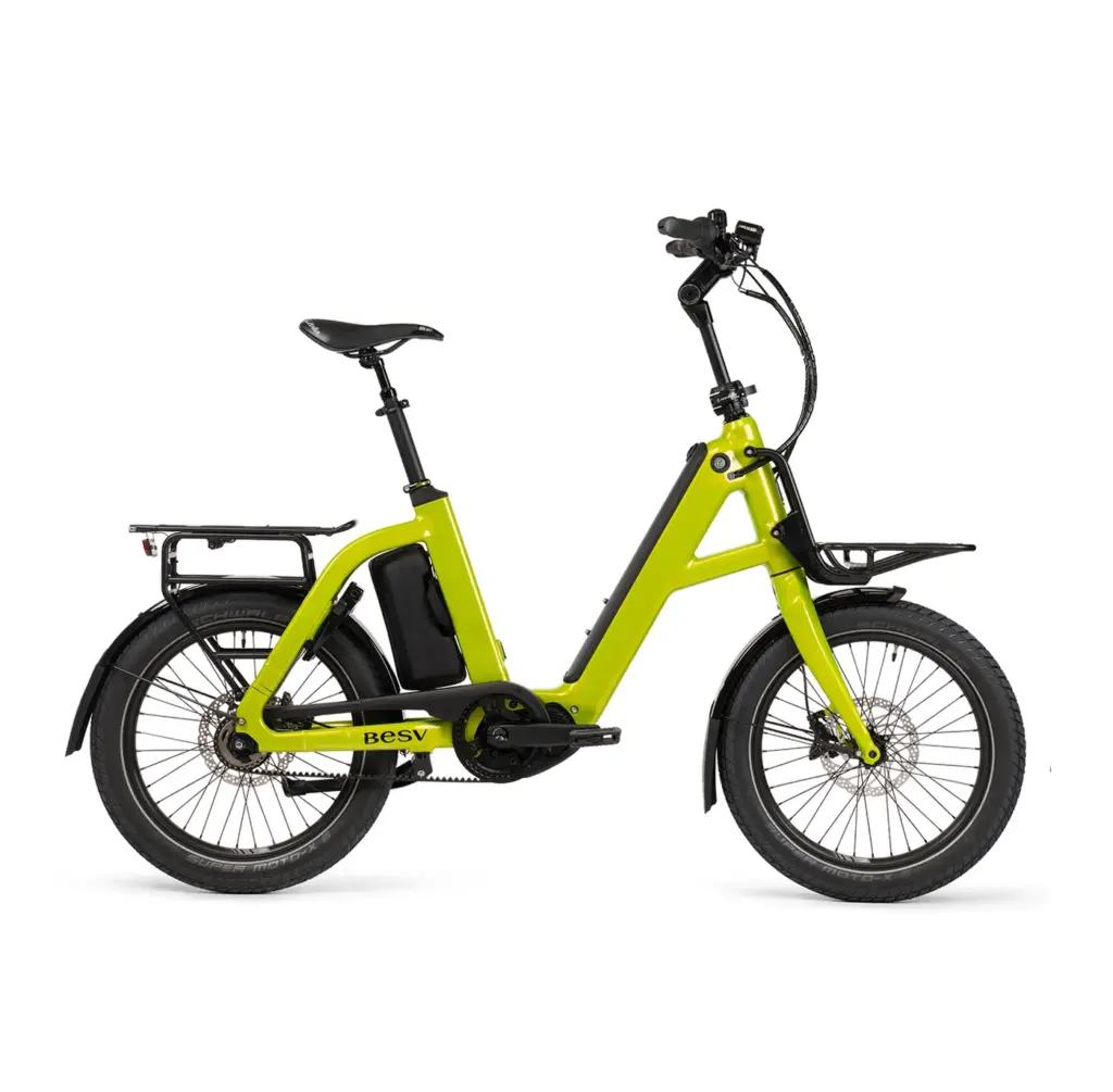 Kompaktes E-Bike BESV CPT 1.0 in limegrün, von der Seite fotografiert.