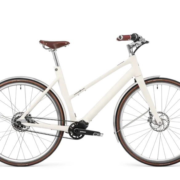 Schindelhauer Antonia E-Bike in Sahneweiß mit braunem Ledersattel und Ledergriffen, seitliche Ansicht