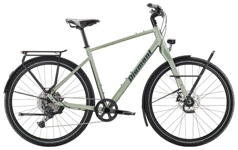 Diamant Nhoma Stepover Gravelbike in Seitenansicht mit Gepäckträger, Schutzblechen und vollausgestatteter Technik