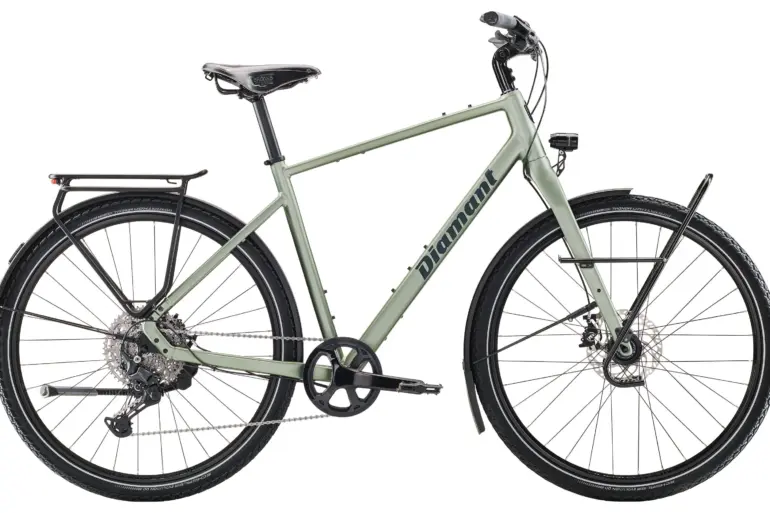 Diamant Nhoma Stepover Gravelbike in Seitenansicht mit Gepäckträger, Schutzblechen und vollausgestatteter Technik
