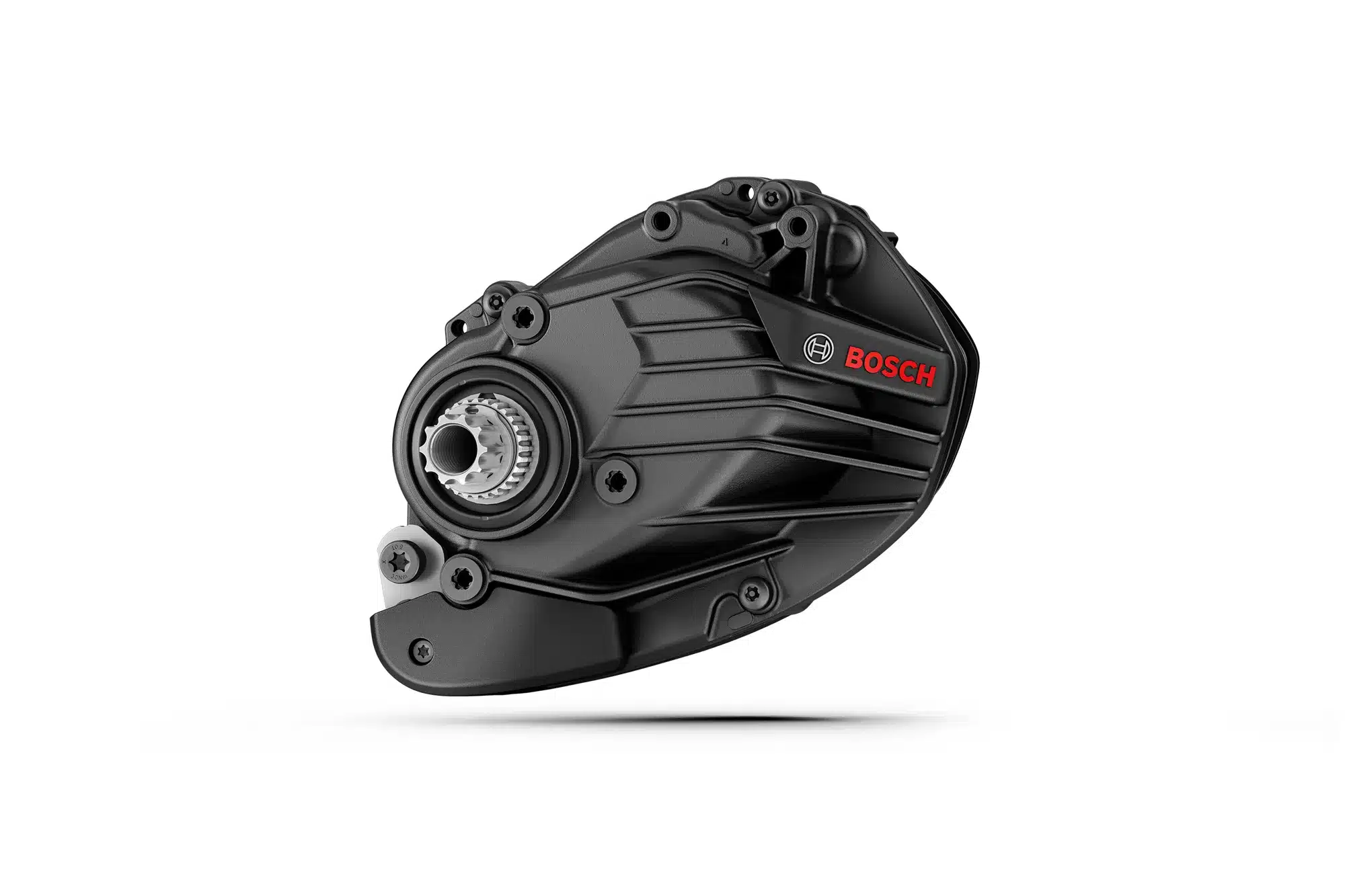 Ein schwarzer Bosch Performance CX E-Bike Mittelmotor mit rotem Bosch Logo im Detail, isoliert auf weißem Hintergrund.