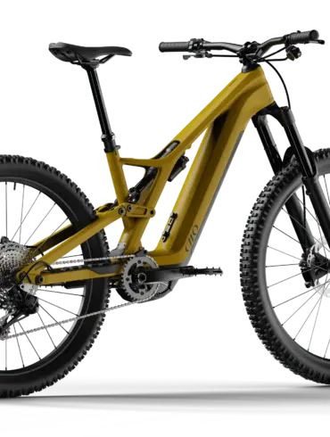 Seitenansicht eines gelben CILO Kyano HC Full-Assist E-MTB mit schwarzen Reifen und Felgen, sowie schwarzen Federungskomponenten und Sattel.