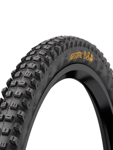 Profilansicht eines Continental Argotal Mountainbike-Reifens mit deutlichem Stollenmuster und dem gelben "ARGOTAL"-Schriftzug.