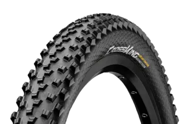 Profil und Seitenwand eines Continental Cross King ShieldWall Mountainbike-Reifens mit "PureGrip Compound" und "ShieldWall System" Beschriftung.