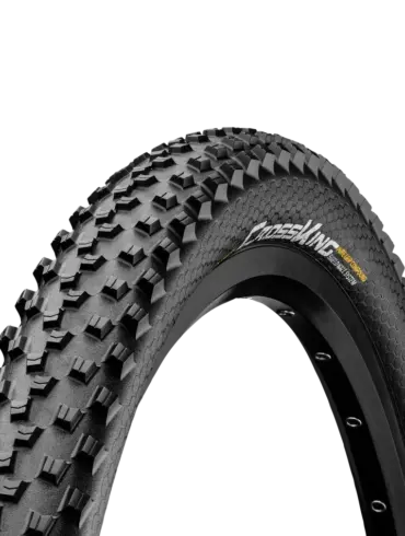 Profil und Seitenwand eines Continental Cross King ShieldWall Mountainbike-Reifens mit "PureGrip Compound" und "ShieldWall System" Beschriftung.