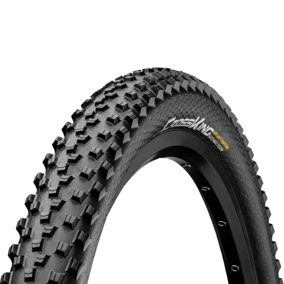 Profil und Seitenwand eines Continental Cross King ShieldWall Mountainbike-Reifens mit "PureGrip Compound" und "ShieldWall System" Beschriftung.
