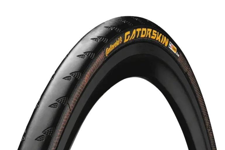 Continental Gatorskin Fahrradreifen, zeigt die Lauffläche mit Profil und die Seitenwand mit dem Aufdruck 'GATORSKIN' und brauner DuraSkin-Schutzschicht.