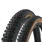 Zwei Continental Trinotal Fahrradreifen, die für feuchten Untergrund und gemischtes Gelände entwickelt wurden. Das Profil ist deutlich erkennbar.