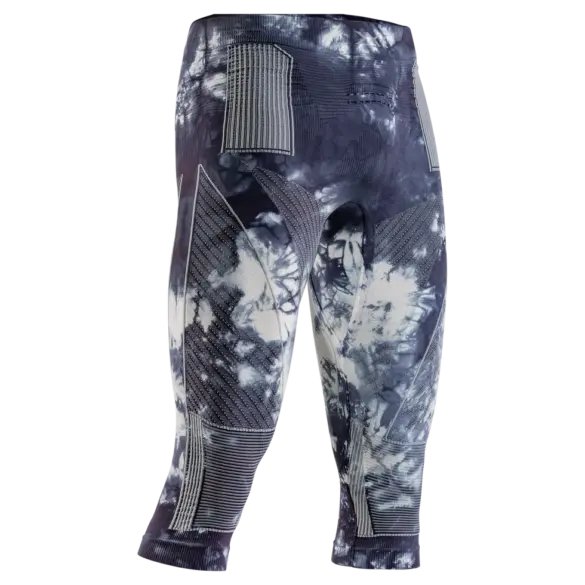 X-BIONIC Energy Accumulator Wild 3/4 Pants in dunklem Marmor-Muster mit weißen Akzenten und silbernen Zonen.