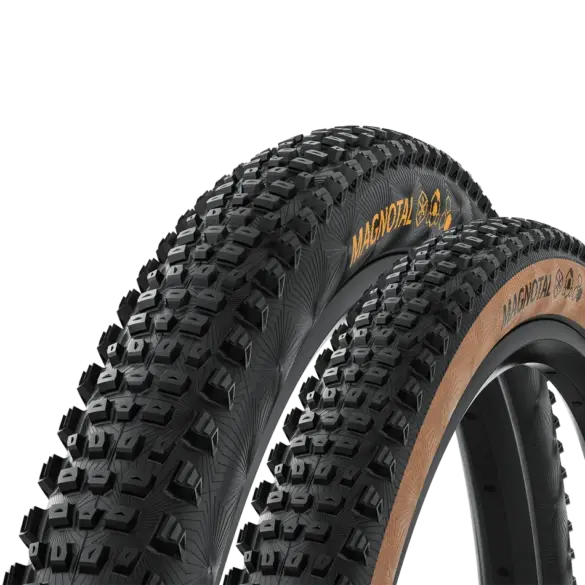 Nahaufnahme von zwei Continental Magnotal Mountainbike-Reifen, ein Reifen mit brauner Seitenwand ist im Vordergrund, dahinter ein Reifen mit schwarzer Seitenwand.
