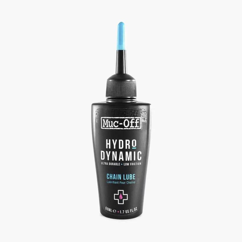Flasche mit Muc-Off Hydrodynamic Lube Kettenschmiermittel, schwarz mit blauem Applikator.