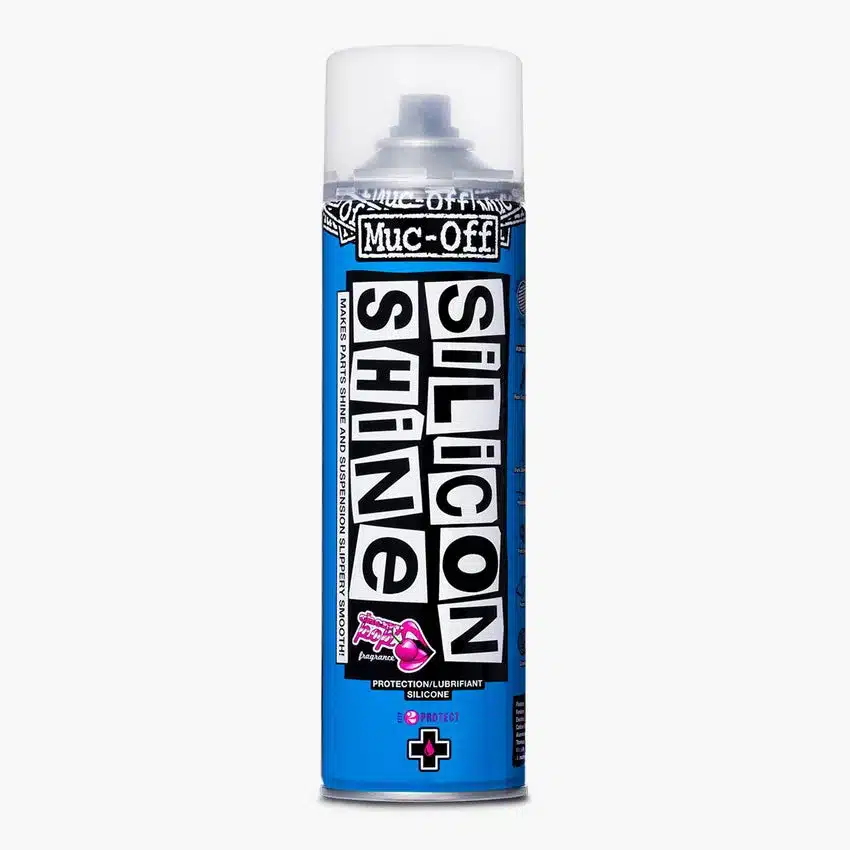 Eine blaue Aerosoldose des Produkts Muc-Off Silicon Shine mit weißer und schwarzer Schrift.