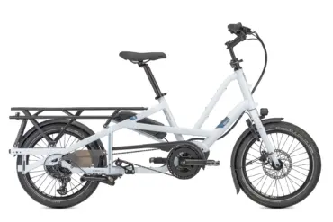 Seitliche Ansicht eines hellgrauen Tern Quick Haul Long D9 Cargobikes mit Gepäckträger und Bosch-Antrieb