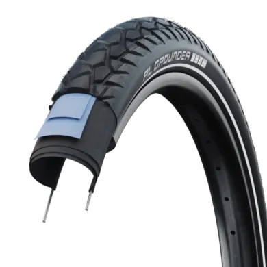 Schnittbild eines Schwalbe Al Grounder Fahrradreifens, der seine mehrschichtige Konstruktion und das Profil zeigt.