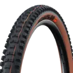 Nahaufnahme eines Schwalbe Big Betty Fahrradreifens mit brauner Seitenwand und schwarzem Profil auf einem Felgenrand.