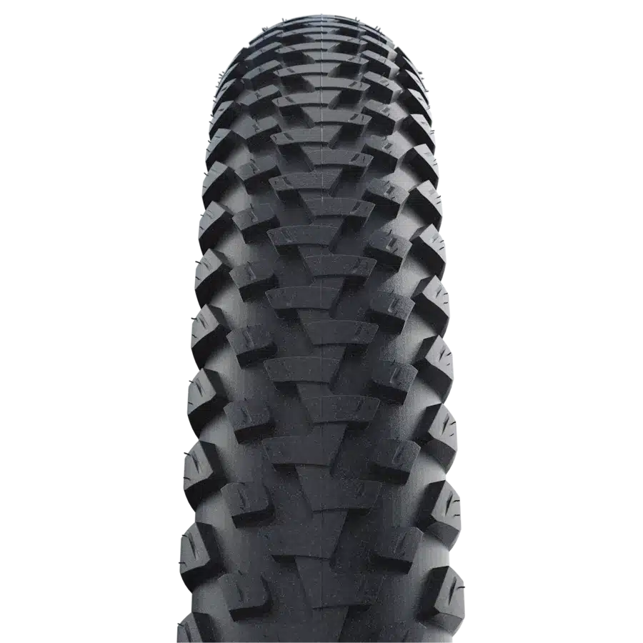 Profil des Schwalbe Marathon Plus MTB Reifens mit Blockprofil und Seitennoppen.