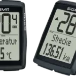 Zwei SIGMA BC 14.0 WR Fahrradcomputer, nebeneinander positioniert. Der linke zeigt 20.4 km/h und die Temperatur 23.5 °C. Der rechte zeigt 28.4 km/h und eine Strecke von 136.51 km.