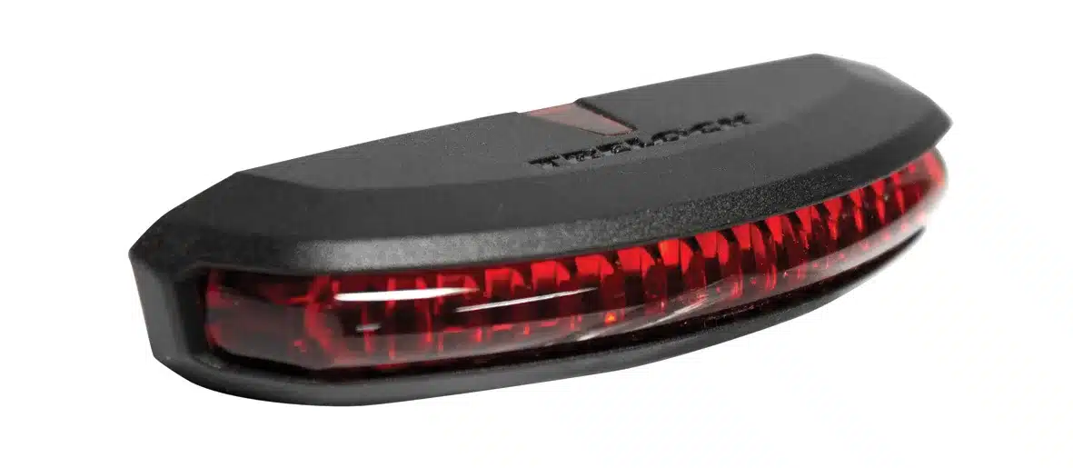 Schwarz-rotes Trelock LS 653 COB Line Dynamo Fahrrad-Rücklicht mit LED-Beleuchtung.