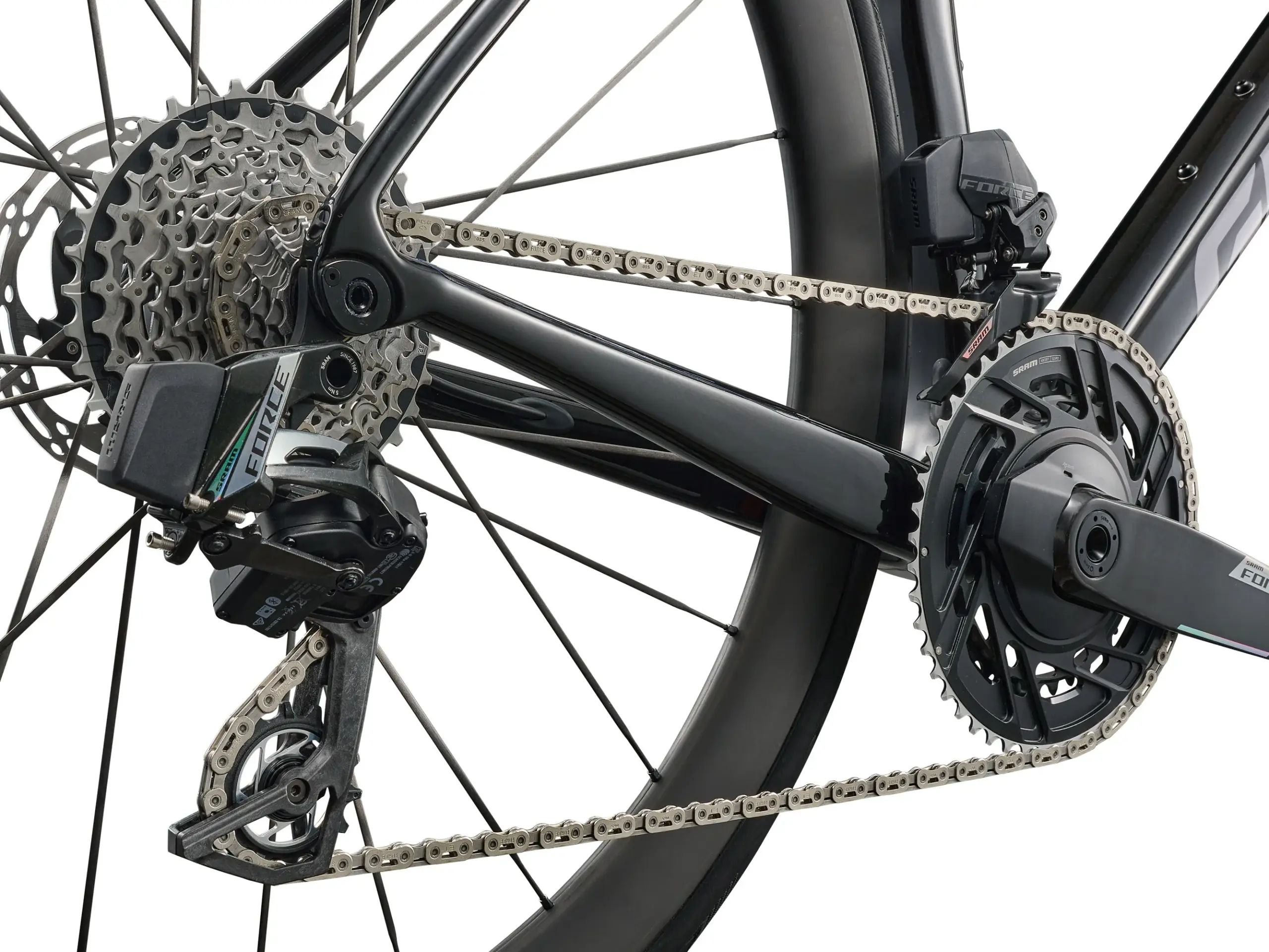 Detailaufnahme des Antriebsstrangs eines Giant TCR Advanced Pro 0 AXS Rennrads, inklusive Kassette, Kette, Schaltwerk und Kurbelsatz.