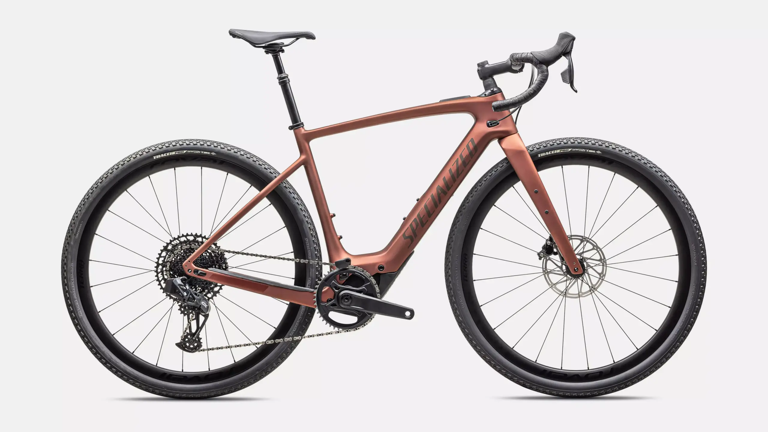 Side view of a Specialized Turbo Creo 2 Expert E-Gravelbike in a metallic copper color, with black wheels, tires, saddle, and handlebars.