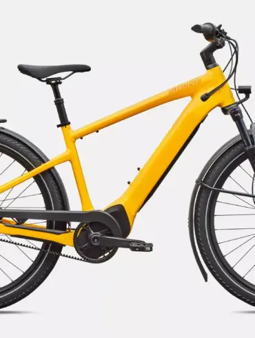 Gelbes Specialized Turbo Vado 4.0 IGH E-Bike von der Seite betrachtet.