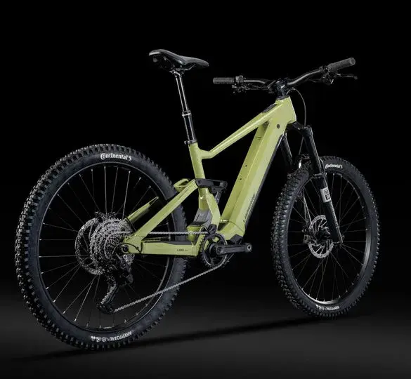 Ein Lapierre Overvolt AM AL 5.8 E-Mountainbike in hellgrüner Farbe, von der Seite mit Fokus auf den Rahmen, die Federung und die Räder.