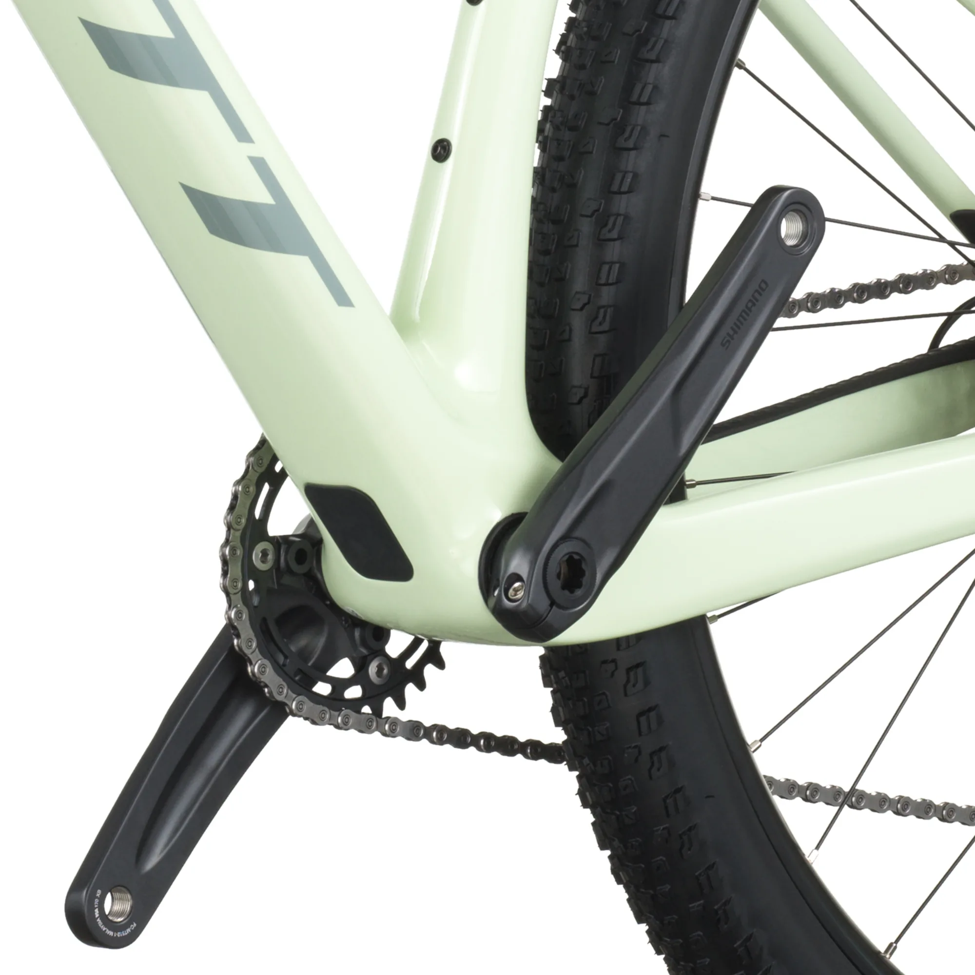 Detailansicht des Hinterbaus eines hellgrünen SCOTT Scale 920 Mountainbikes mit schwarzer Kurbelgarnitur und Kette.