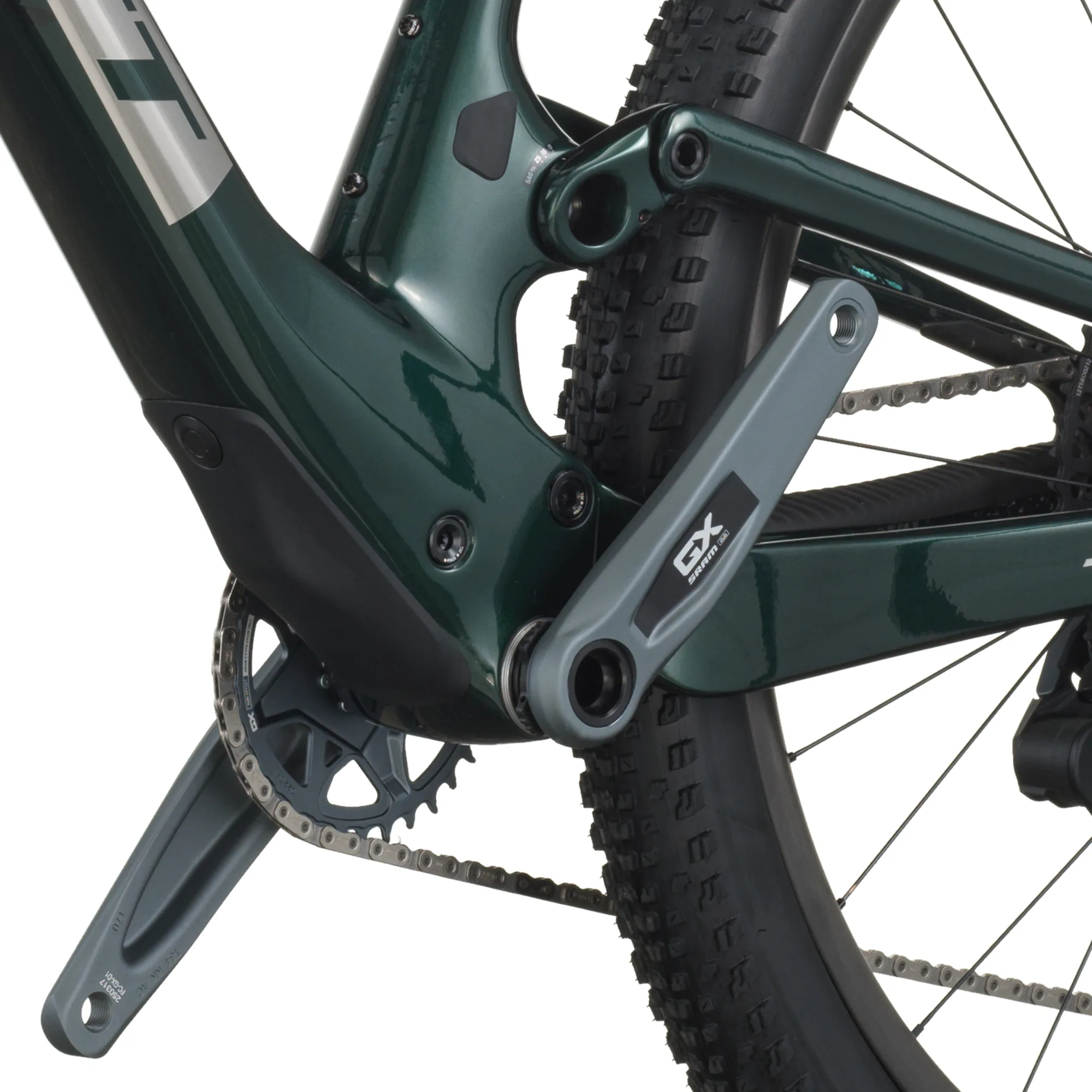Nahaufnahme des Hinterbaus und des Antriebsstrangs eines SCOTT Spark RC Team Issue Mountainbikes, Fokus auf die grüne Lackierung und die SRAM GX Eagle AXS Kurbelgarnitur.