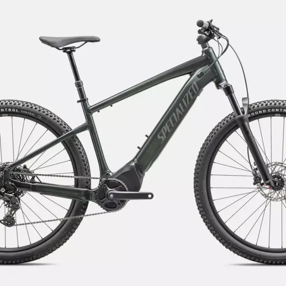 Dunkelgrünes Specialized Turbo Tero 4.0 E-Bike mit 29-Zoll-Rädern, Federgabel und integriertem Akku, in Seitenansicht auf neutralem Hintergrund.