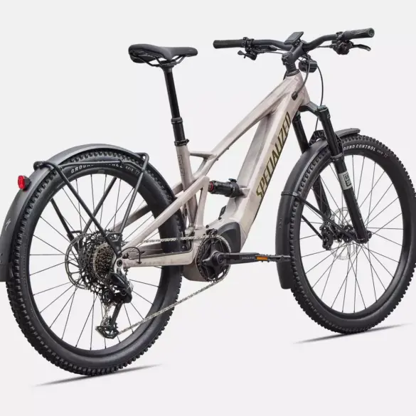 Seitenansicht eines Specialized Turbo Tero X 6.0 E-Bikes in Sandsteinmetallic.