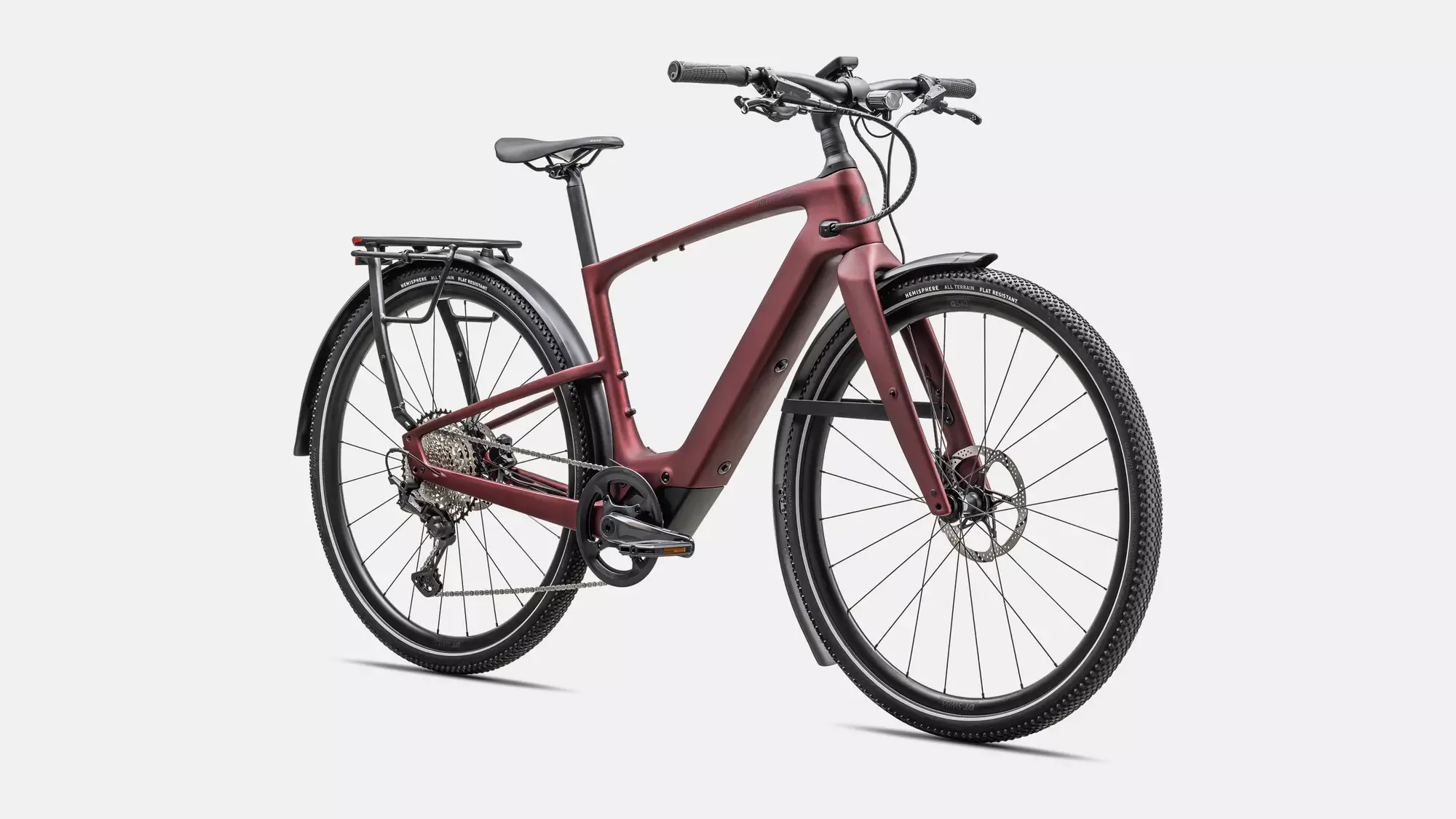 Ganzansicht des Specialized Turbo Vado SL 2 6.0 EQ Carbon E-Bikes in der Farbe Rot, mit integrierten Schutzblechen, Gepäckträger und Scheibenbremsen.