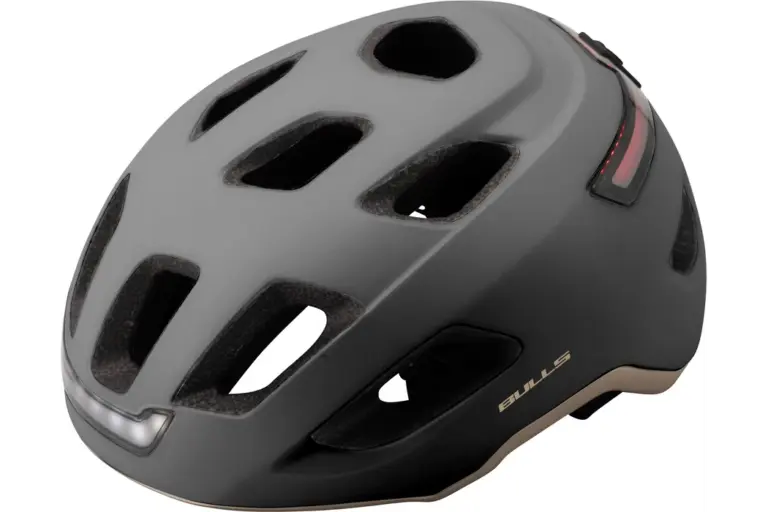 Grauer Vorix City-Helm mit integrierter Front- und Rückbeleuchtung, geeignet für den täglichen Fahrradverkehr.