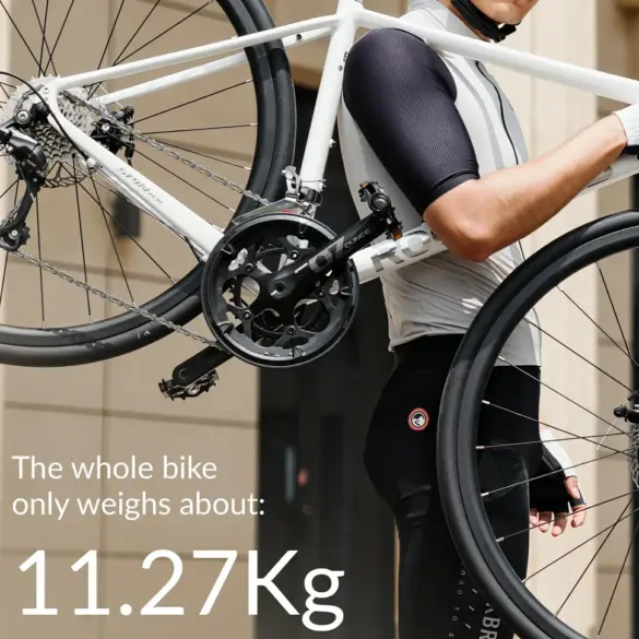 Nahaufnahme des SPIN W2M Rennrads, getragen von einer Person, mit prominent dargestelltem Gewicht von 11,27 kg.