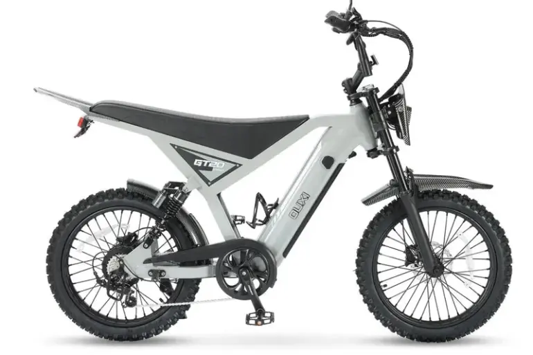 Seitenansicht eines OUXI GT20 Pro Skinnybikes in Hellgrau mit schwarzen Reifen, Federung und sportlichem Rahmen.